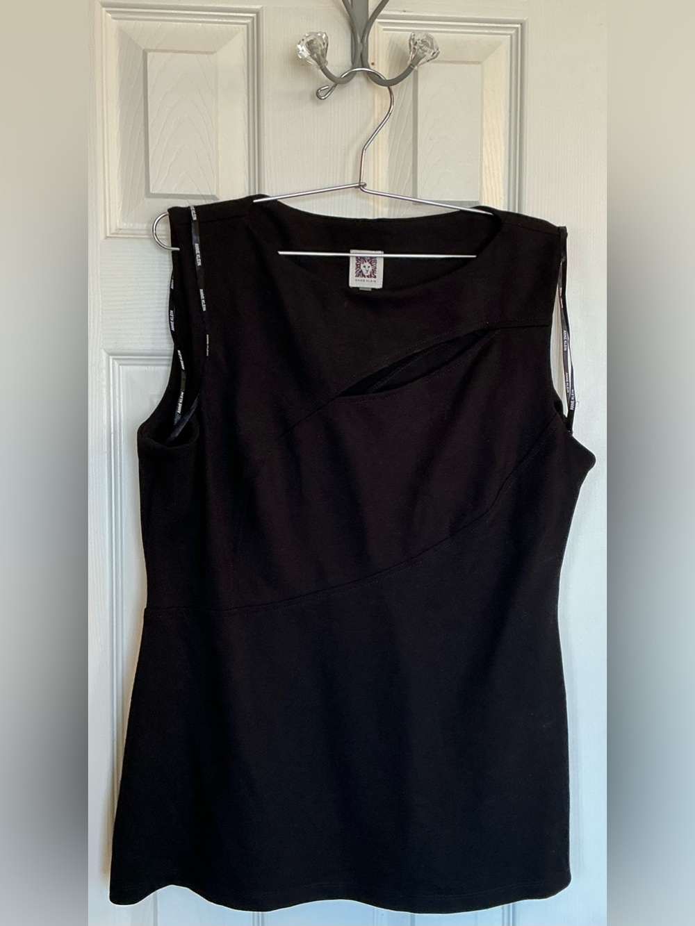 Anne Klein black sleeveless top with a distinctive diagonal chest cutout Size 12
